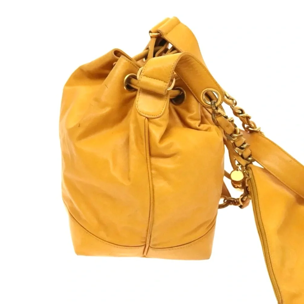 Authentic CHANEL yellow lambskin bucket bag with wallet pouch
